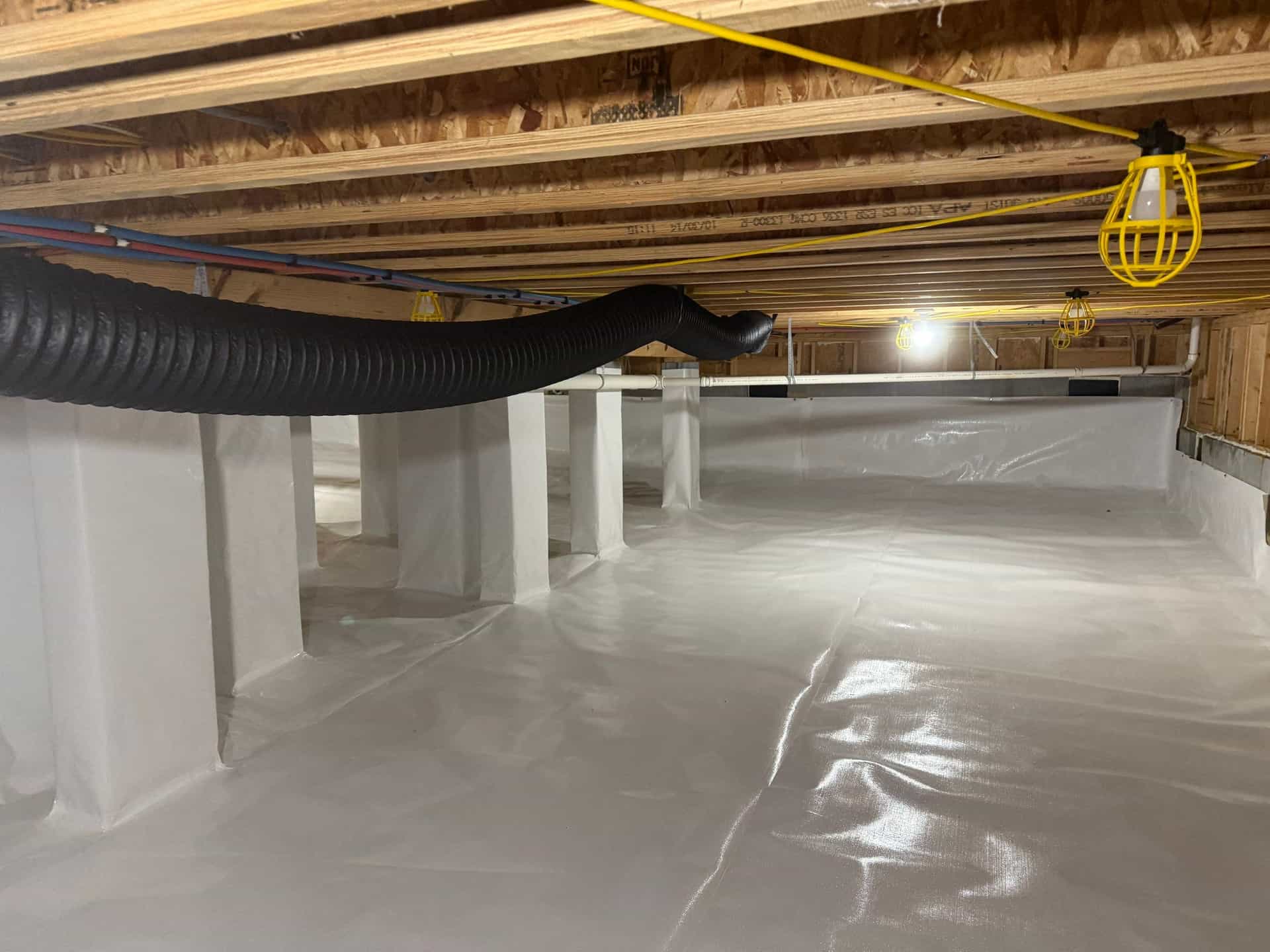 HydroHelp911 Crawl Space & Foundation Repair completed a full crawl space encapsulation system with a vapor barrier.