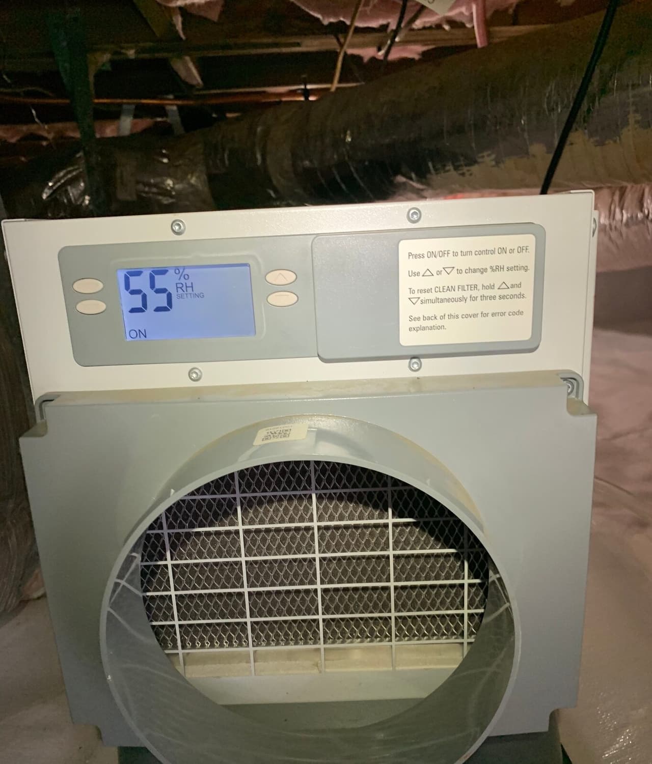 Crawl space dehumidifier installed on the crawl space liner.