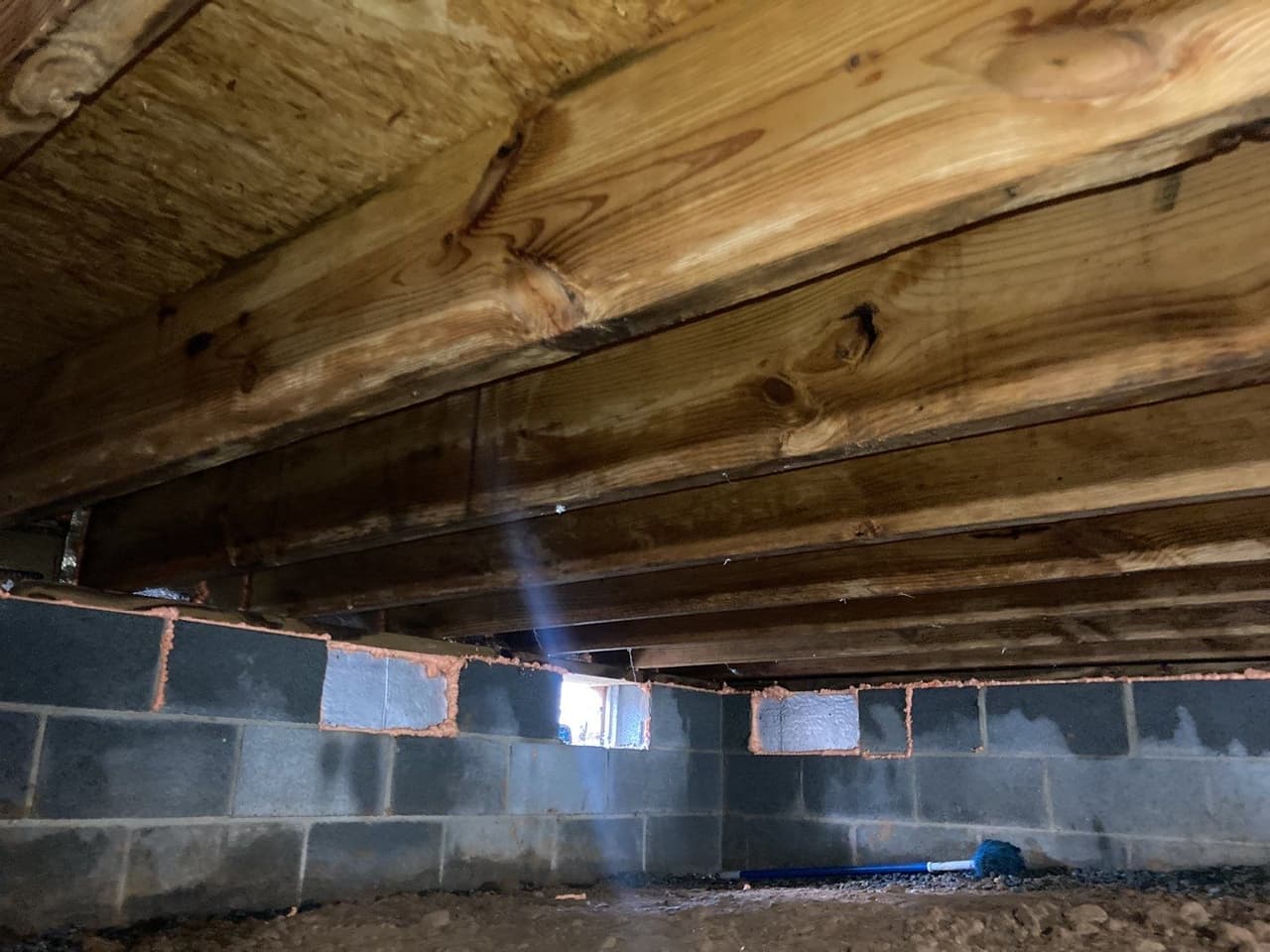 HydroHelp911 Crawl Space & Foundation Repair sealing crawl space vents to prevent moisture and wood rot.