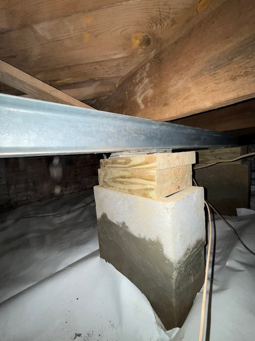 HydroHelp911 Crawl Space & Foundation Repair installing floor joist repair plates, strengthening a steel beam