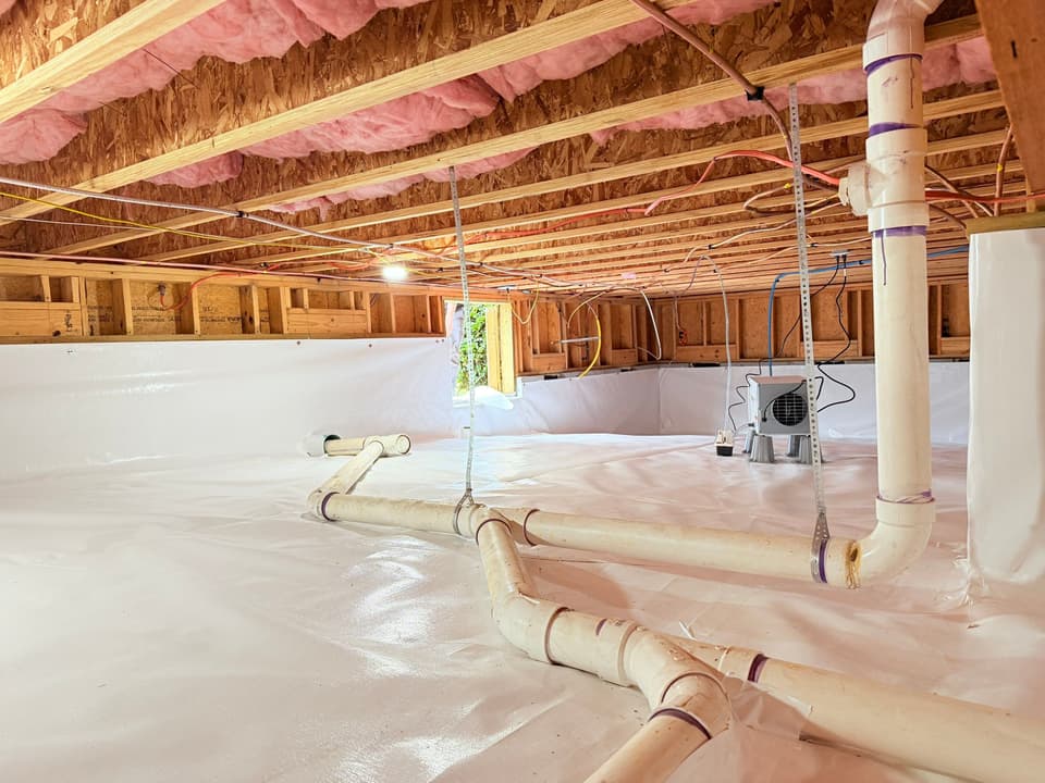 HydroHelp911 Crawl Space & Foundation Repair installing a full crawl space encapsulation system