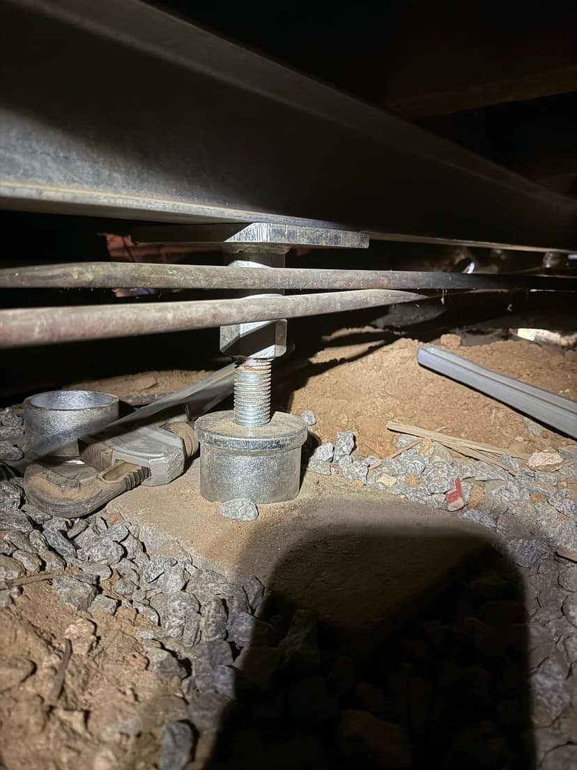 HydroHelp911 Crawl Space & Foundation Repair installing adjustable crawl space jacks for structural support.