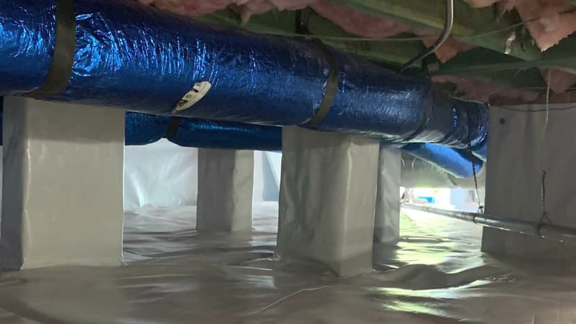 HydroHelp911 Crawl Space & Foundation Repair installing a complete crawl space encapsulation system.