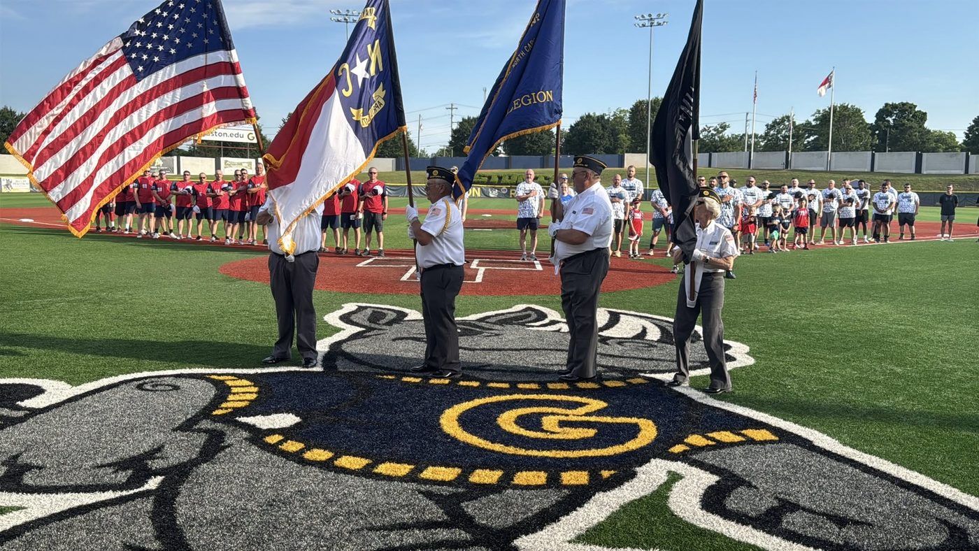 Color guard presenting flags at the Gastonia Fire vs Police charity softball game benefiting Special Olympics of Gaston County